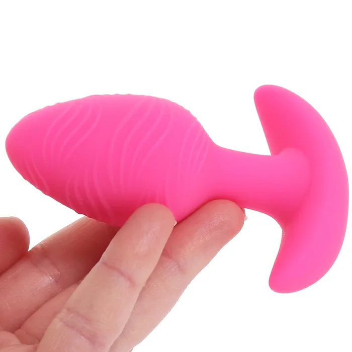 Anal Cheeky GlowInTheDark Vibrating Butt Plug in Pink CalExotics
